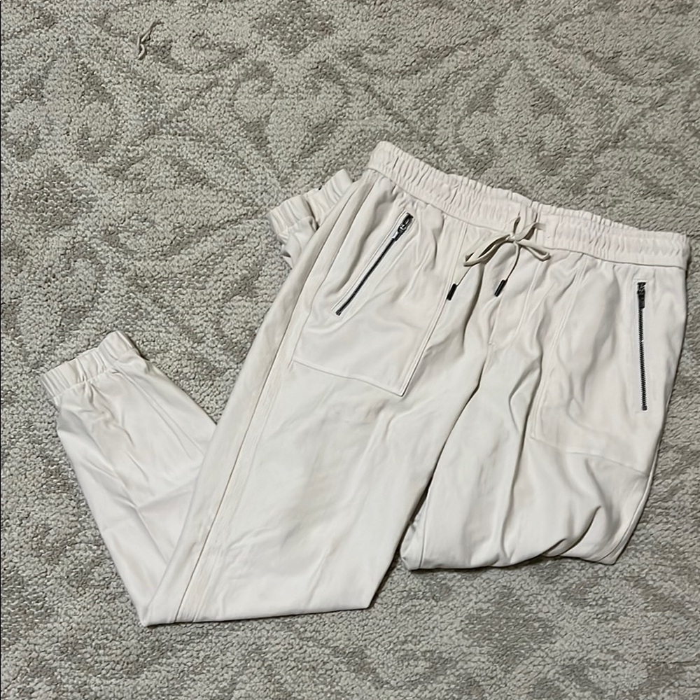 Super cute Athleta Cream Joggers with Zipper detail - size 8